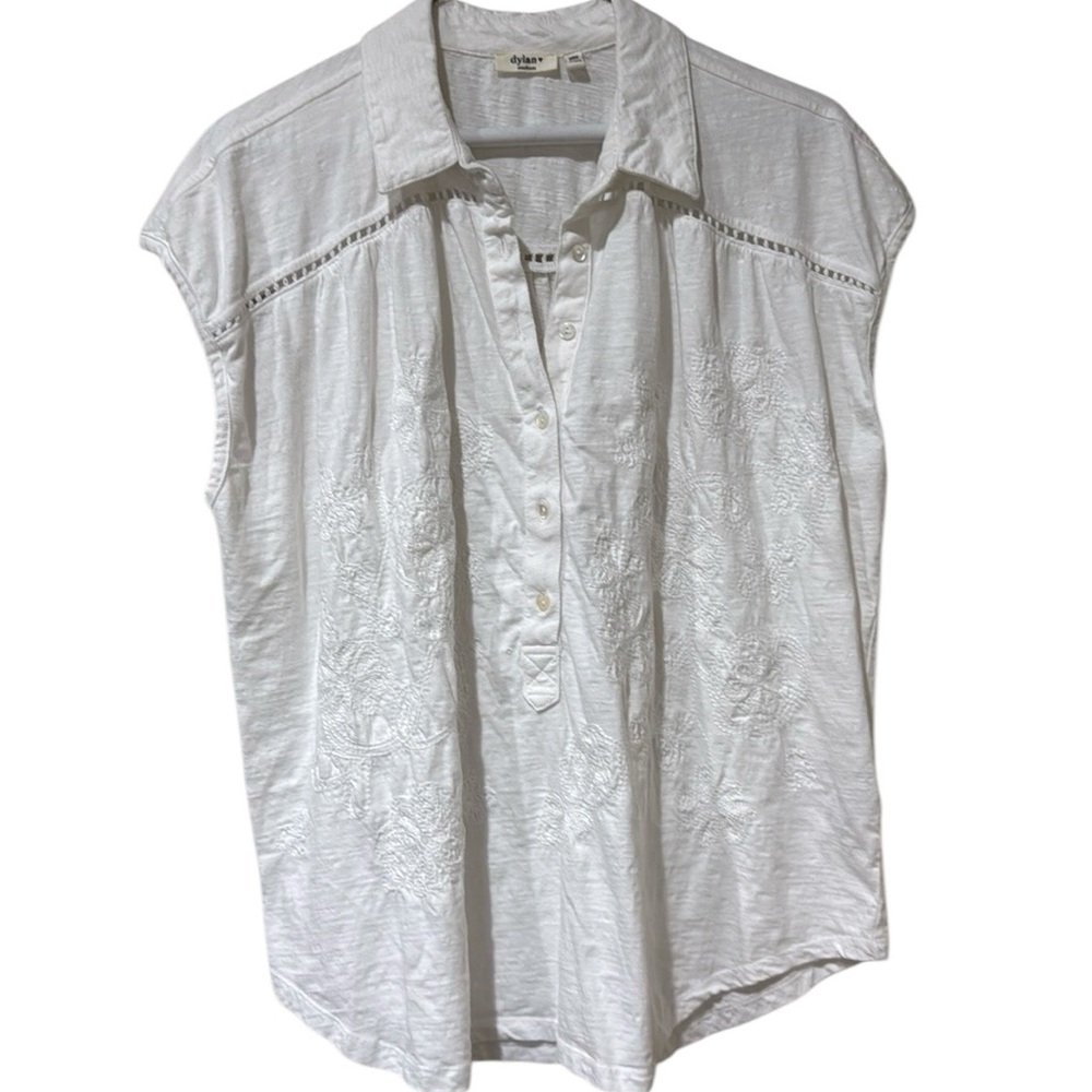 Anthropologie cream sleeveless blouse with front button placket